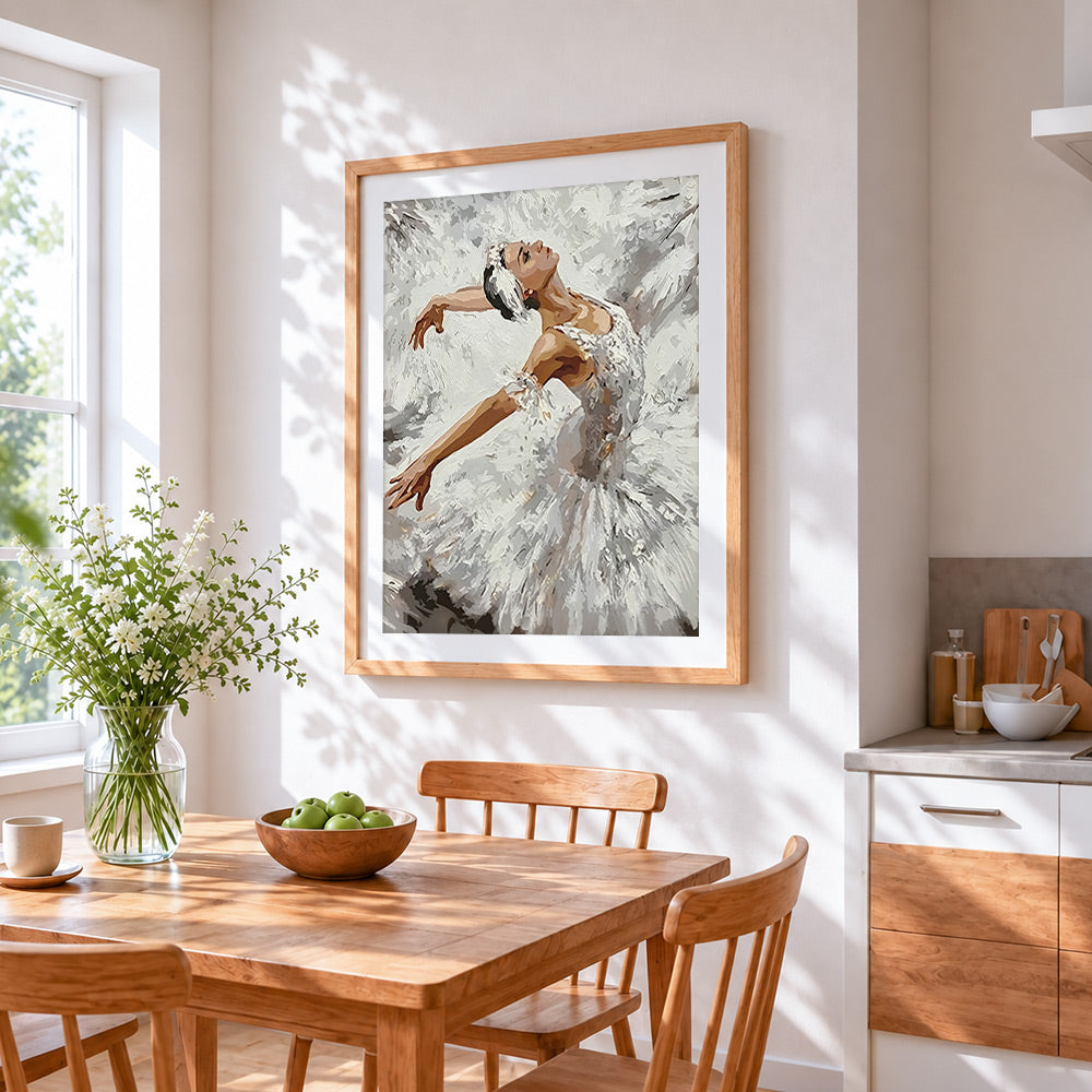 Swan lake ballerina portrait cross stitch artwork displayed on wall as home decor