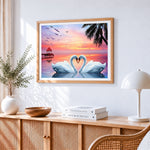 Swans forming a heart at sunset paint by numbers artwork displayed on wall as home decor