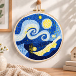 Swirling starry sky art embroidery hoop wall art displayed as warm and cosy handmade home decor