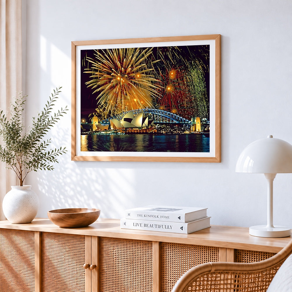 Sydney opera house and fireworks cross stitch artwork displayed on wall as home decor