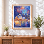 Finished sydney opera house with fireworks cross stitch artwork displayed