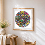 Symmetrical floral mandala cross stitch artwork displayed on wall as home decor