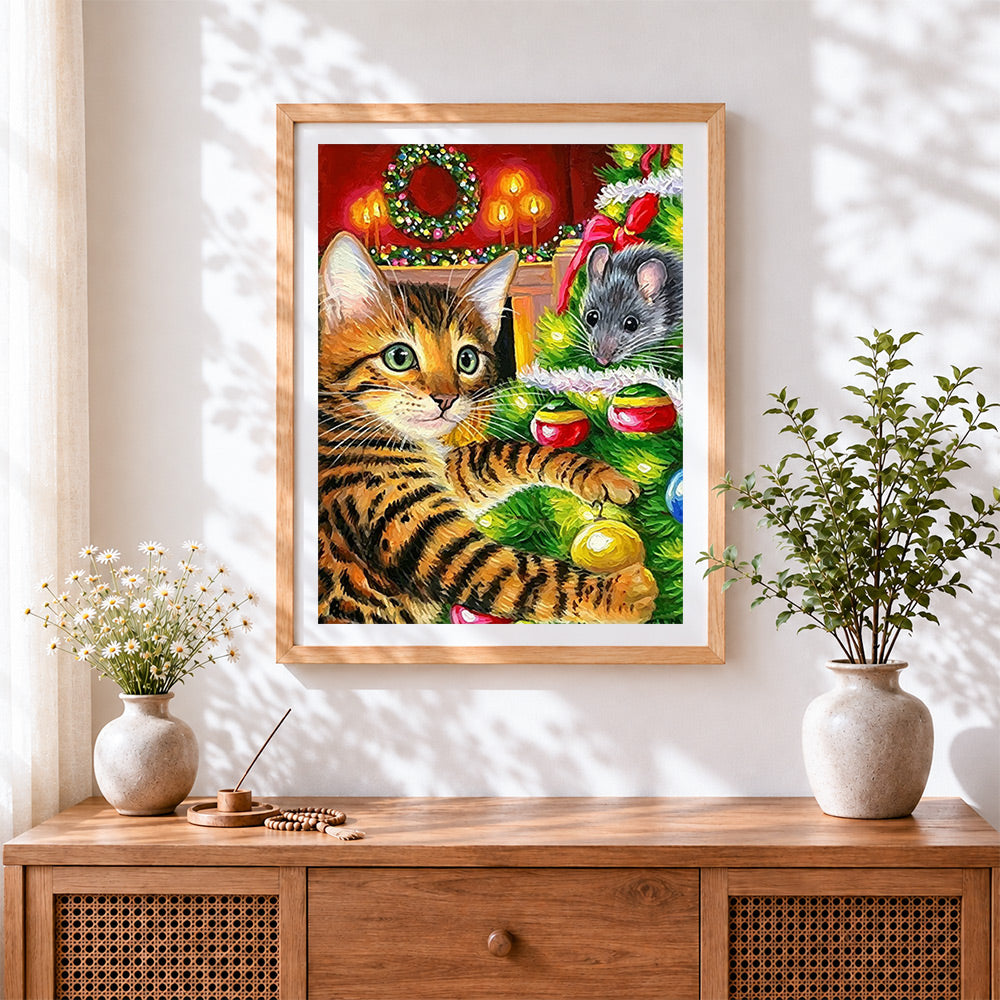 Finished tabby cat and mouse by a christmas tree cross stitch artwork displayed