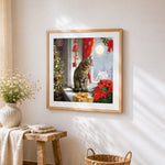 Tabby cat watching snowfall cross stitch artwork displayed on wall as home decor
