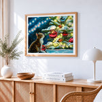 Tabby cat watching the christmas tree cross stitch artwork displayed on wall as home decor