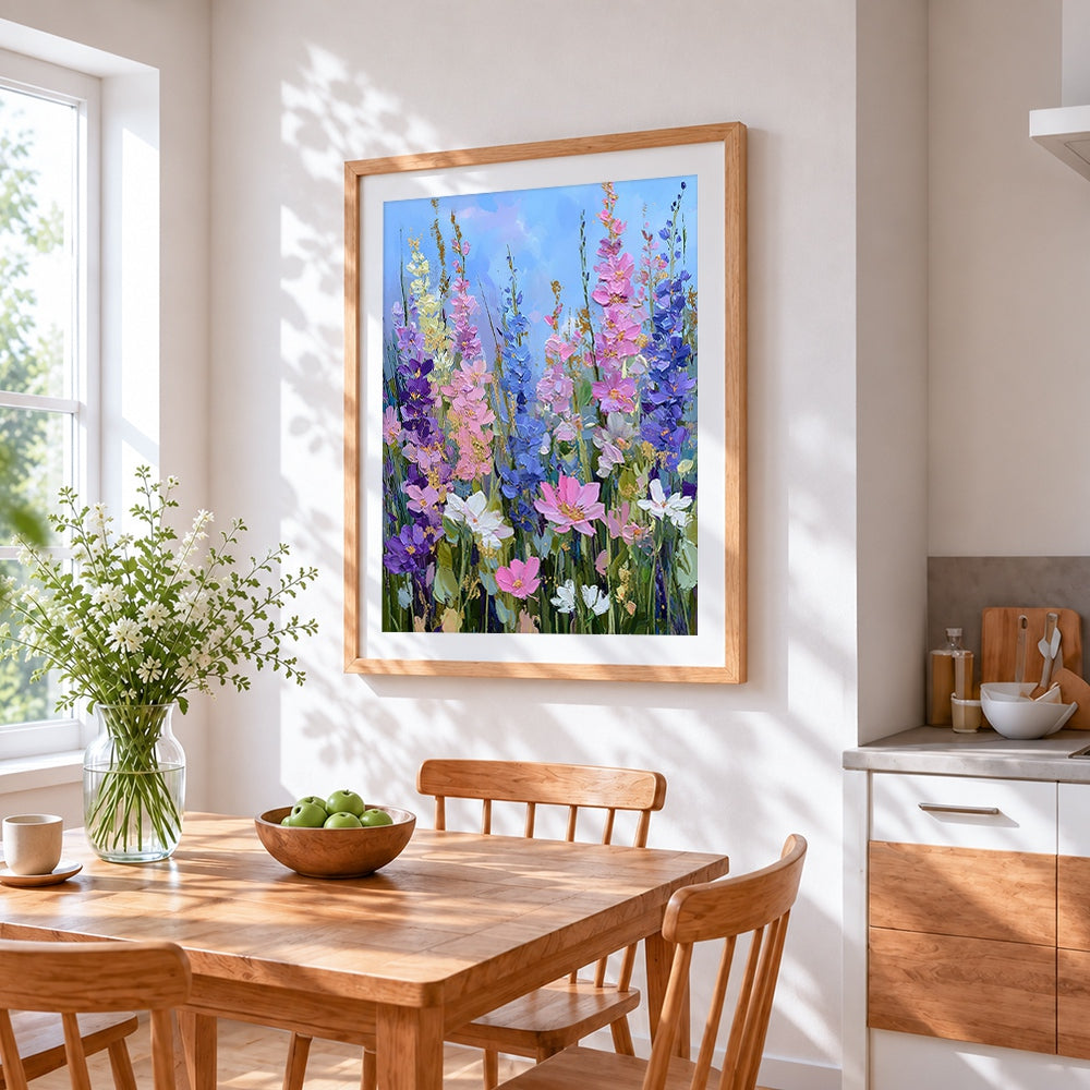 Tall pink and blue wildflowers cross stitch artwork displayed on wall as home decor