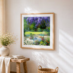 Tea table under wisteria cross stitch artwork displayed on wall as home decor