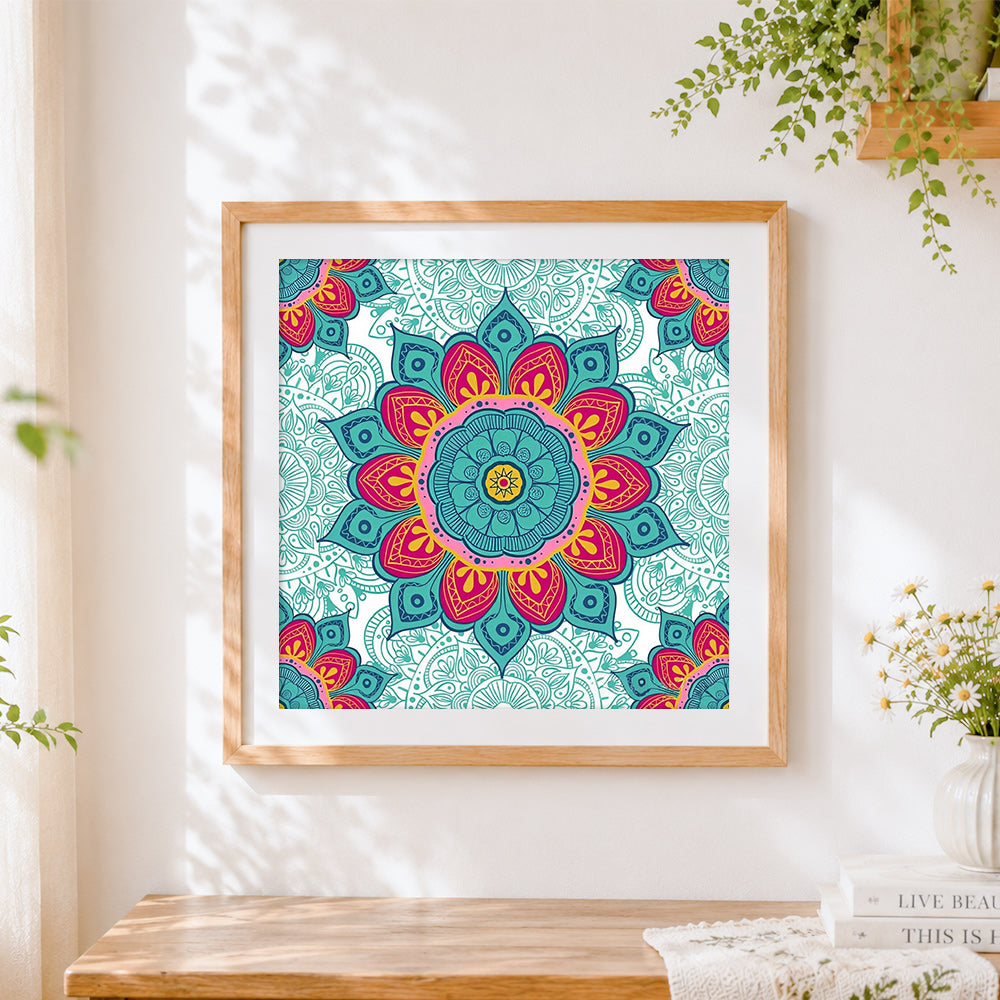 Finished teal and red floral mandala cross stitch artwork displayed