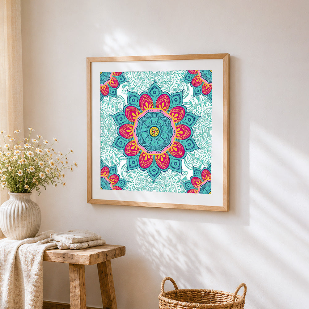 Teal and red floral mandala cross stitch artwork displayed on wall as home decor