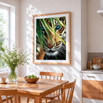 Teal eyed tiger and bamboo cross stitch artwork displayed on wall as home decor