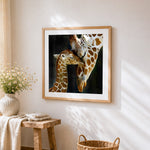 Tender mother and baby giraffe paint by numbers artwork displayed on wall as home decor