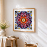 The blooming mandala cross stitch artwork displayed on wall as home decor