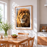 The golden maned lion cross stitch artwork displayed on wall as home decor