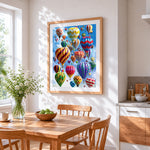 The great balloon ascension cross stitch artwork displayed on wall as home decor