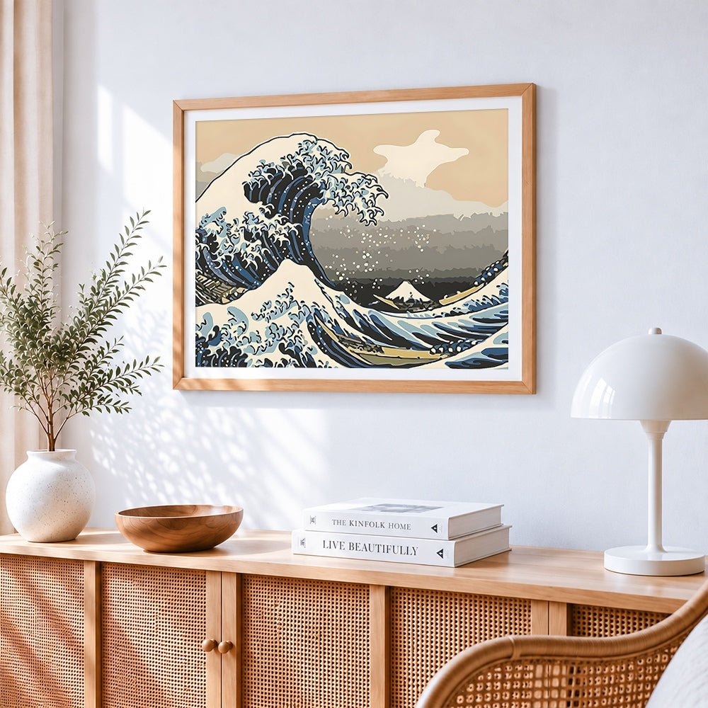 The great wave cross stitch artwork displayed on wall as home decor