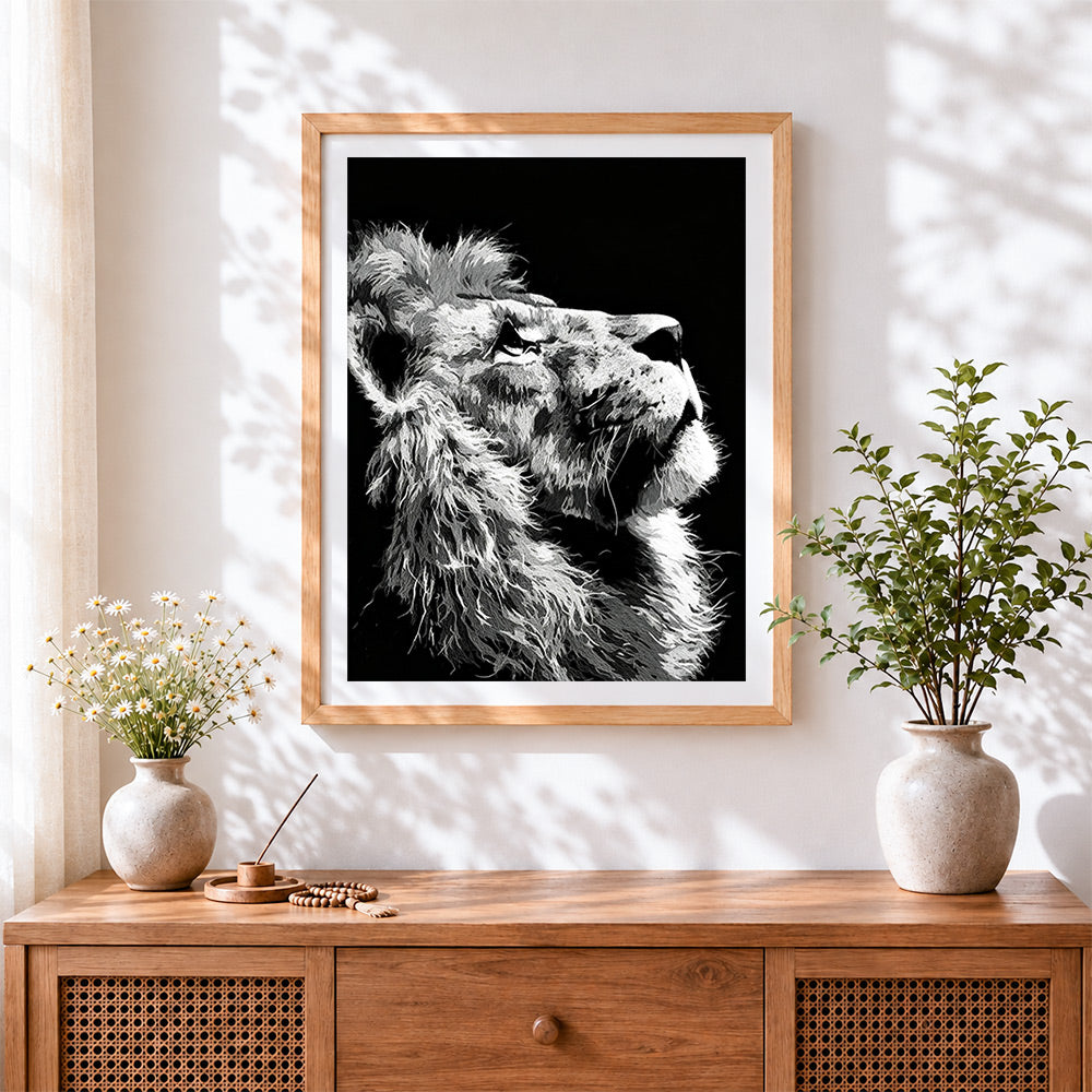 Finished the profile of a lion cross stitch artwork displayed