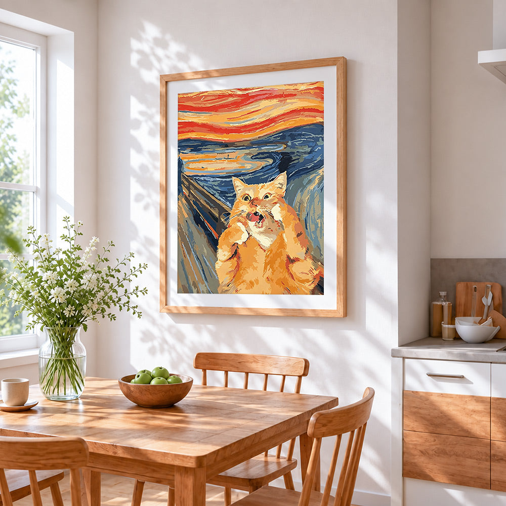 The scream cat cross stitch artwork displayed on wall as home decor