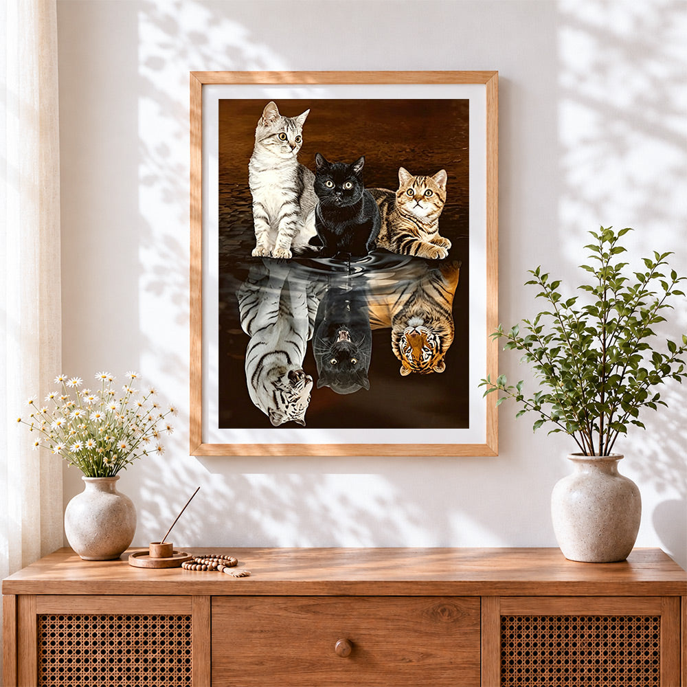 Finished three cats and tiger reflections cross stitch artwork displayed