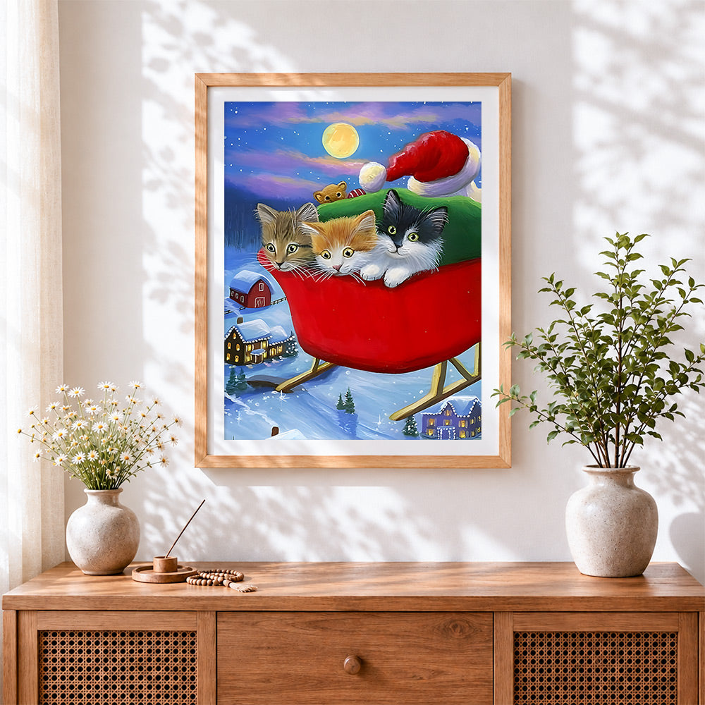 Finished three cute kittens in a sleigh cross stitch artwork displayed