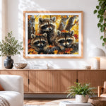Finished three cute raccoons in autumn leaves cross stitch artwork displayed