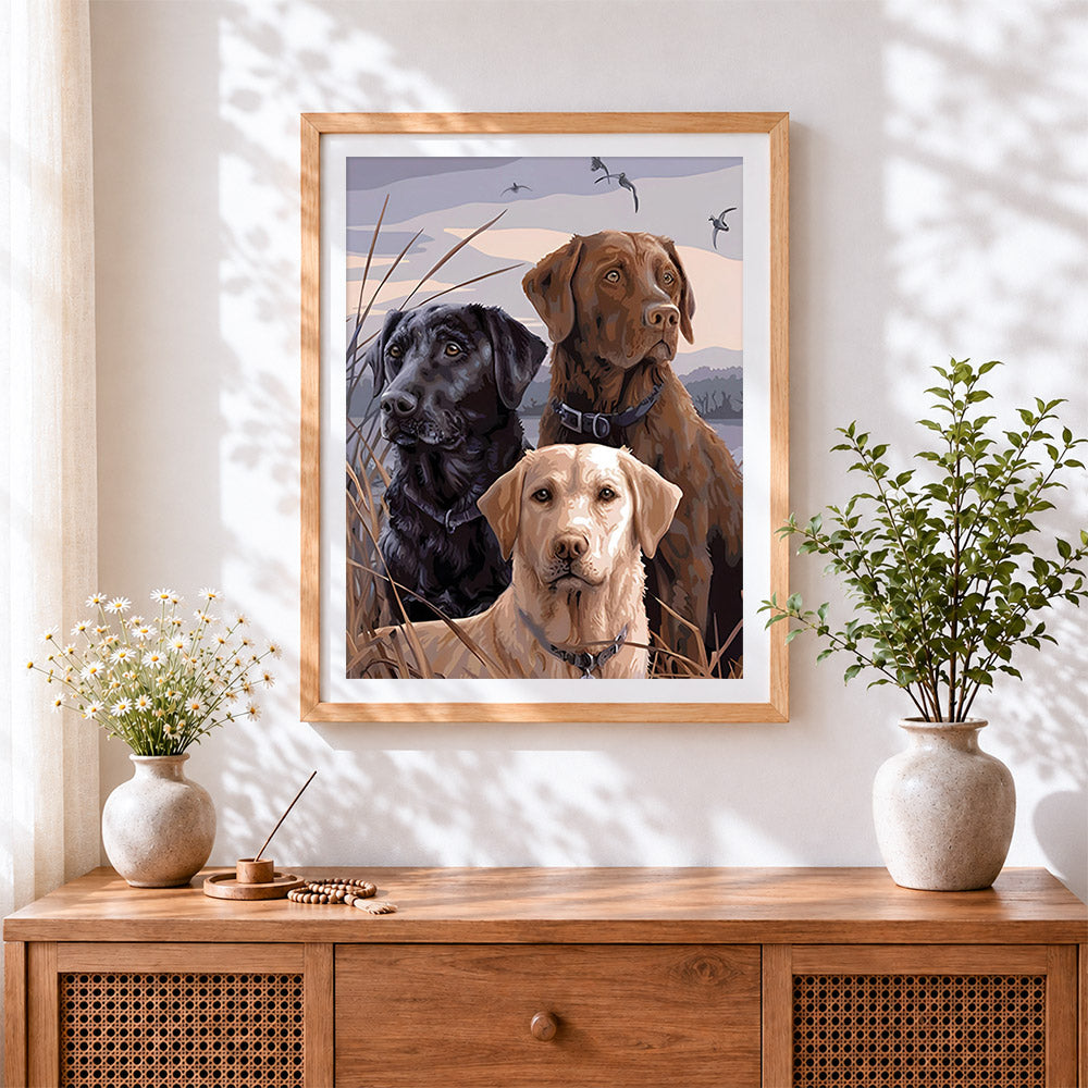 Finished three gun dogs in the reeds cross stitch artwork displayed