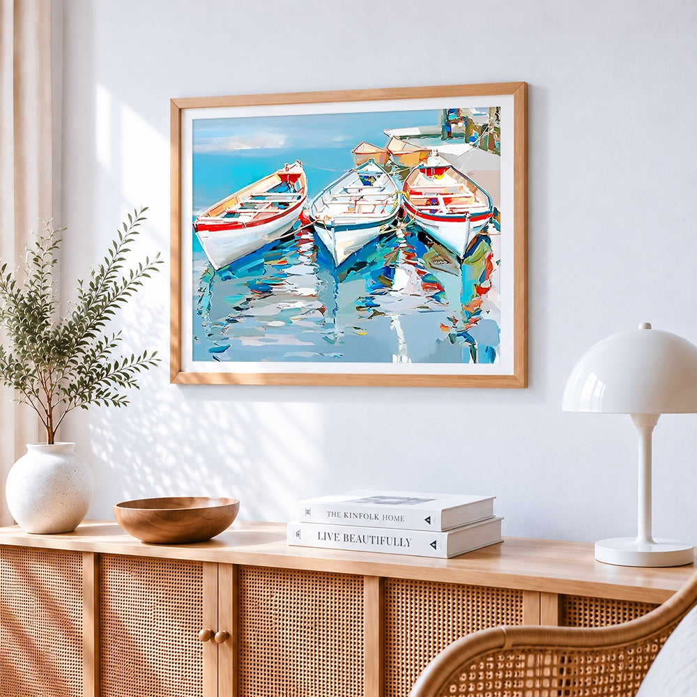 Three white boats paint by numbers artwork displayed on wall as home decor