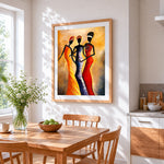 Three women in colourful dresses cross stitch artwork displayed on wall as home decor