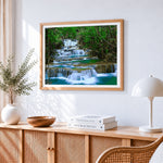 Tiered waterfall in a lush forest paint by numbers artwork displayed on wall as home decor