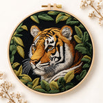 Tiger among green leaves embroidery kit