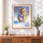 Finished tiger cub in snow cross stitch artwork displayed