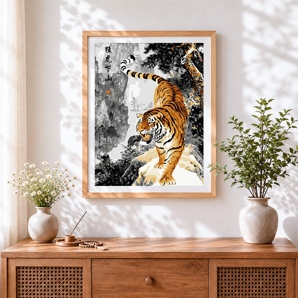 Finished tiger descending the mountain cross stitch artwork displayed