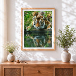 Finished tiger drinking water reflection cross stitch artwork displayed