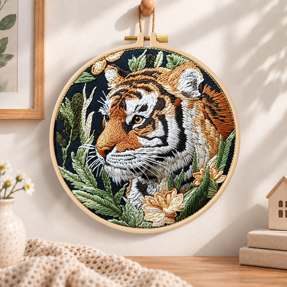 Tiger in jungle foliage embroidery hoop wall art displayed as warm and cosy handmade home decor