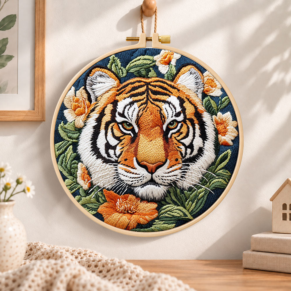 Tiger surrounded by blooms embroidery hoop wall art displayed as warm and cosy handmade home decor