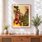 Finished traditional christmas stockings and fireplace cross stitch artwork displayed