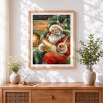 Finished traditional father christmas writing letters cross stitch artwork displayed