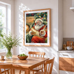 Traditional father christmas writing letters cross stitch artwork displayed on wall as home decor