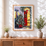 Finished traditional red door and christmas tree cross stitch artwork displayed
