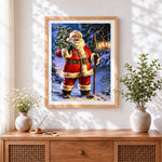 Finished traditional santa with lantern cross stitch artwork displayed