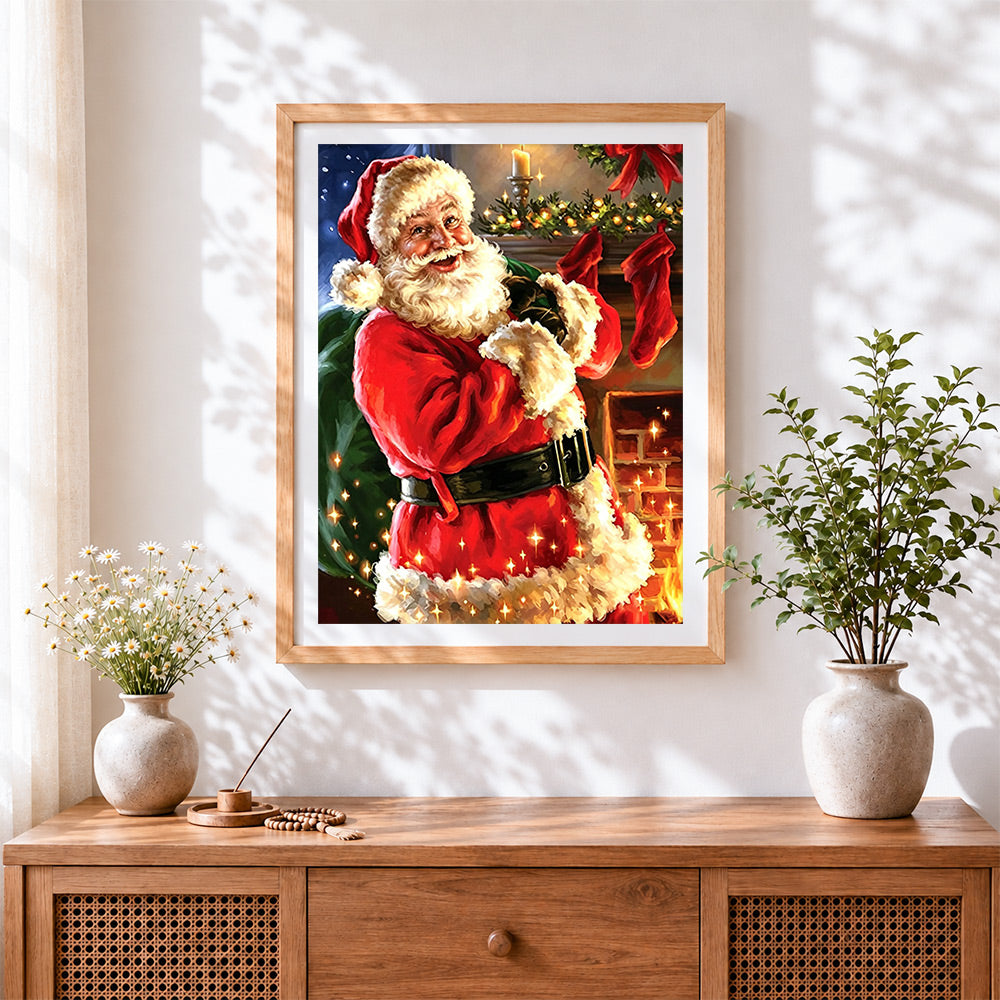 Finished traditional smiling santa with green sack cross stitch artwork displayed