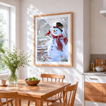 Traditional snowman and red cardinal in the snow cross stitch artwork displayed on wall as home decor