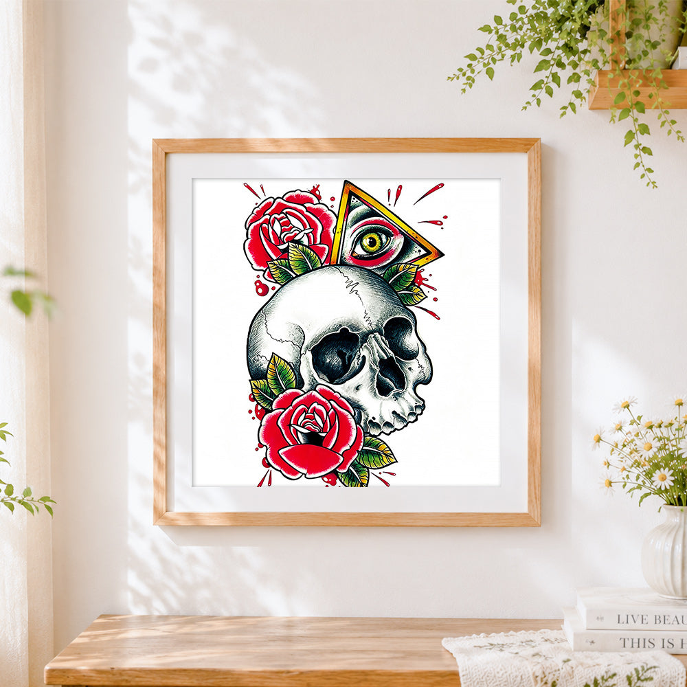 Finished traditional tattoo style skull with roses cross stitch artwork displayed