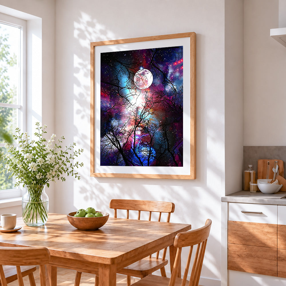 Tree branches and full moon in a starry sky cross stitch artwork displayed on wall as home decor
