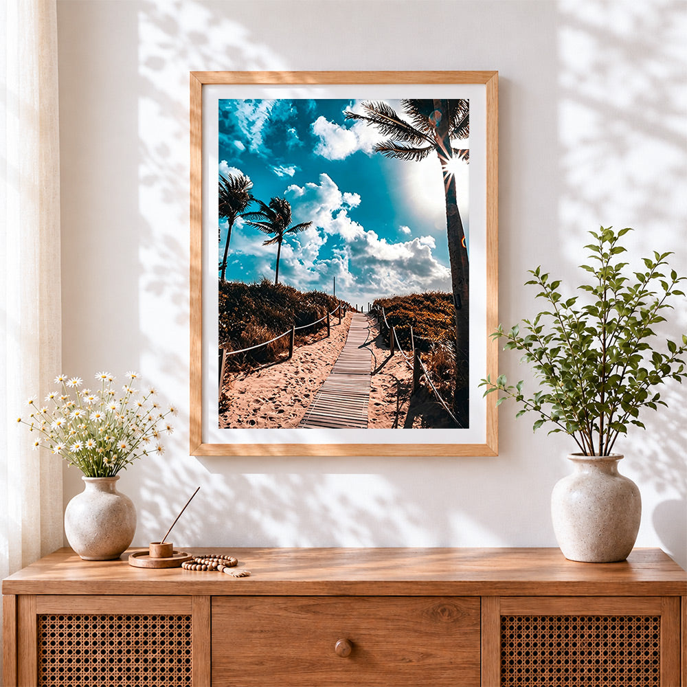 Finished tropical beach boardwalk cross stitch artwork displayed