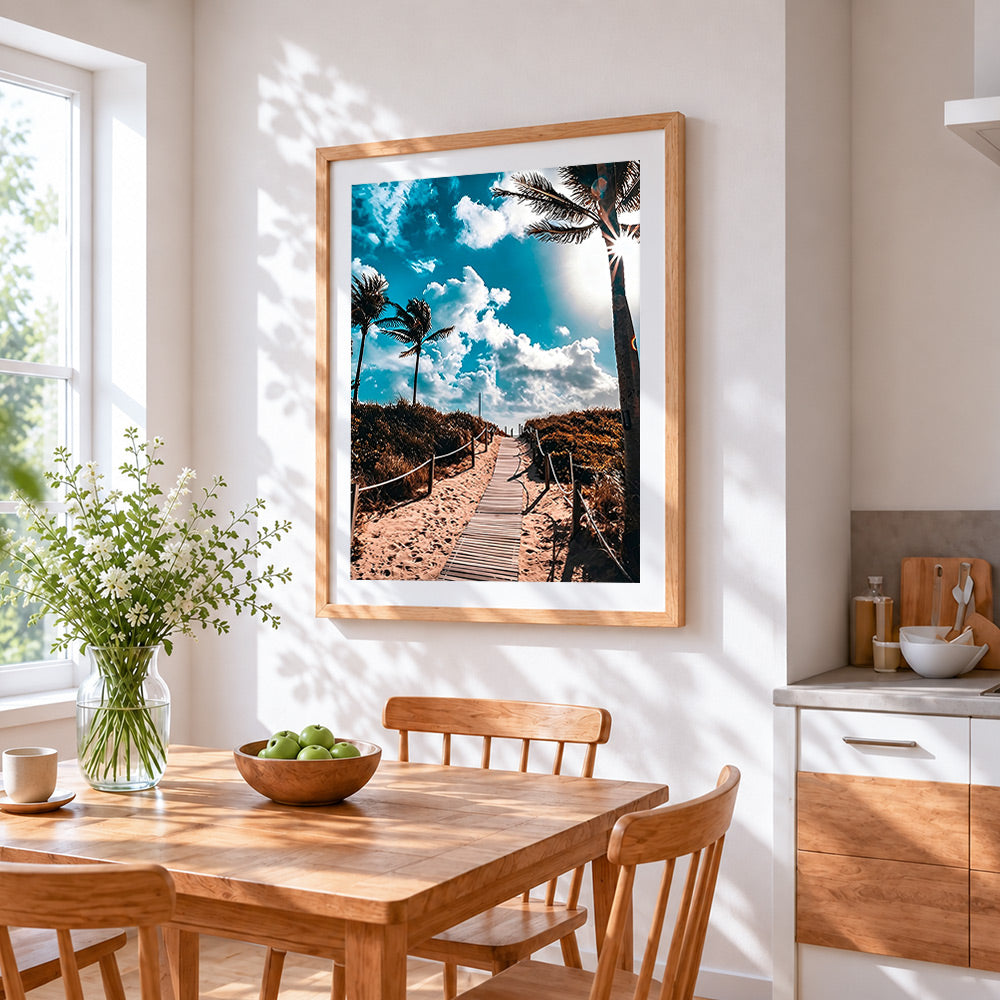 Tropical beach boardwalk cross stitch artwork displayed on wall as home decor