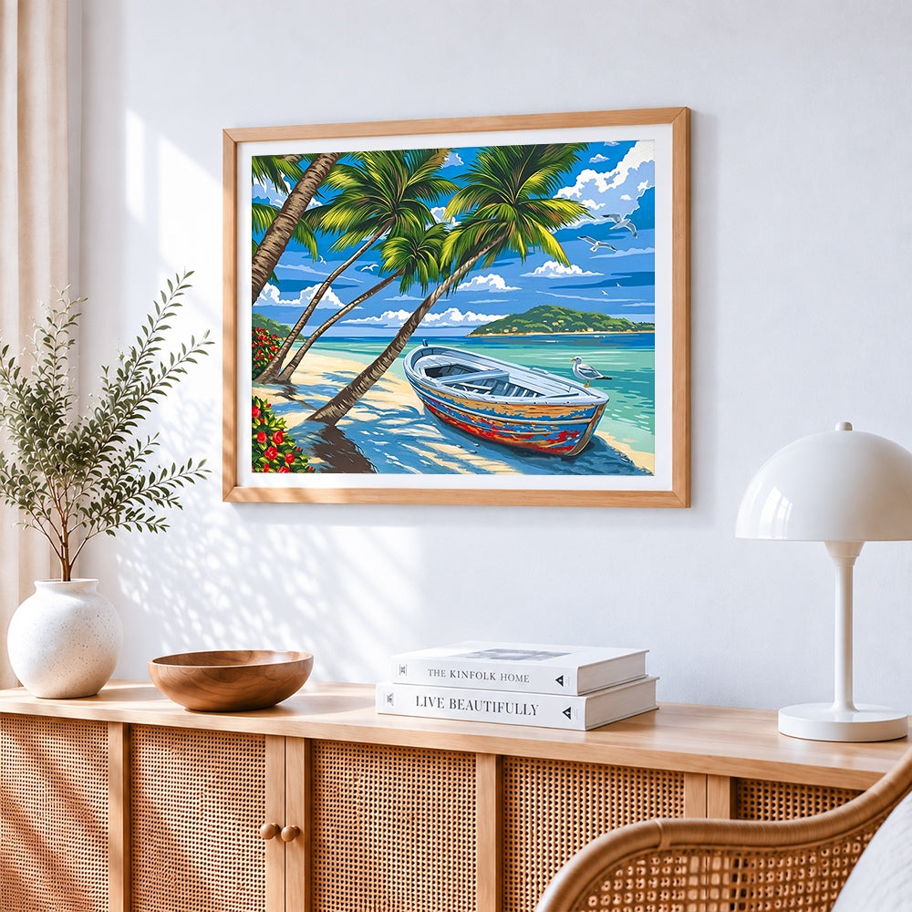 Tropical beach with boat and palm trees cross stitch artwork displayed on wall as home decor