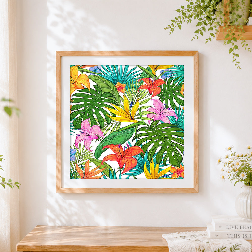 Finished tropical flowers and monstera pattern cross stitch artwork displayed