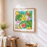 Tropical flowers and monstera pattern cross stitch artwork displayed on wall as home decor