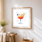 Tropical fruit punch cross stitch artwork displayed on wall as home decor