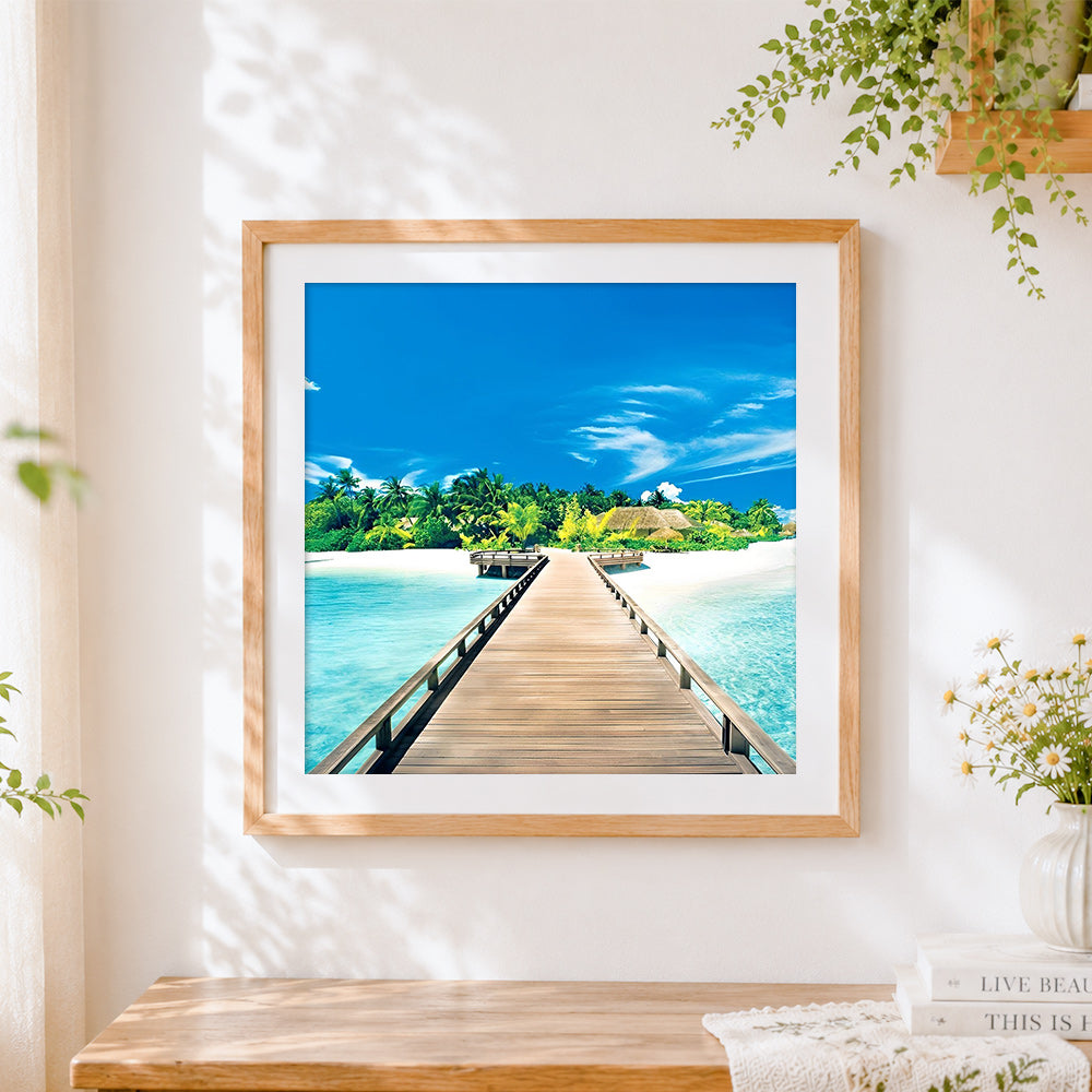 Finished tropical island boardwalk to paradise cross stitch artwork displayed